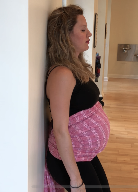 How is a rebozo used in labor?