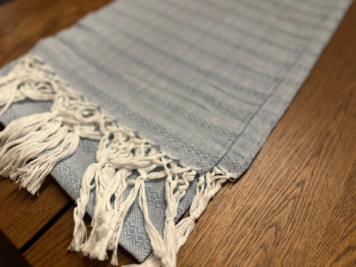 Close-up of the Talavera Azul rebozo's white diamond stripes and white hand-knotted fringe | Lola My Love