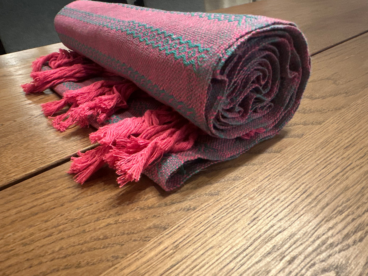 Rolled Tuna Rosa handwoven Mexican cotton rebozo in hot pink with teal diamond stripes and bright pink knotted fringe | Lola My Love
