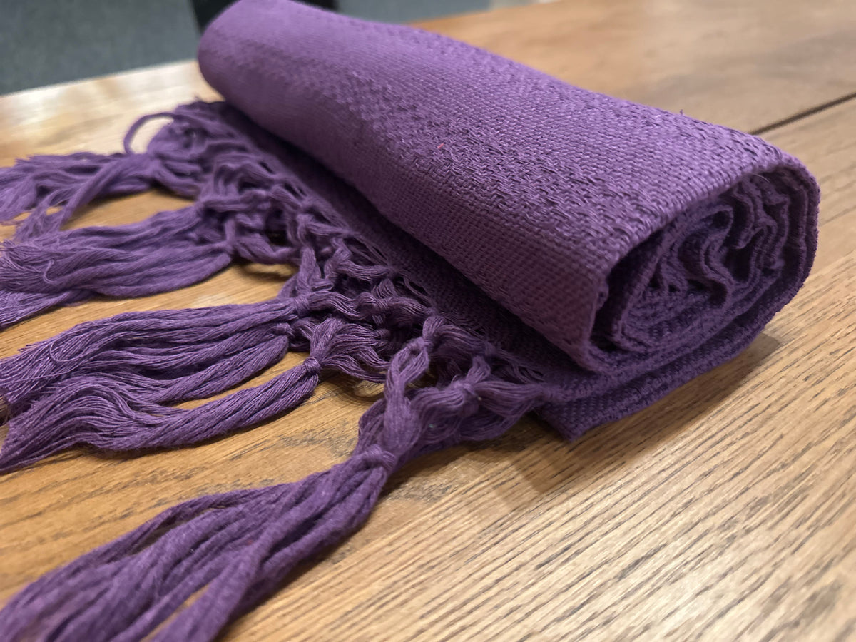 Rolled Uva Morada handwoven Mexican cotton rebozo in solid grape purple with matching purple hand-knotted fringe | Lola My Love