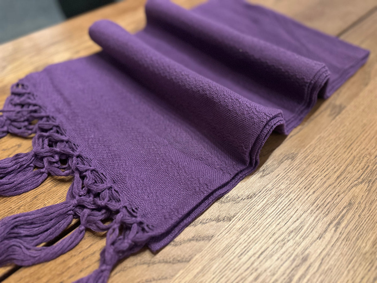Uva Morada solid purple cotton rebozo shawl unrolled in soft folds with hand-knotted fringe | Lola My Love