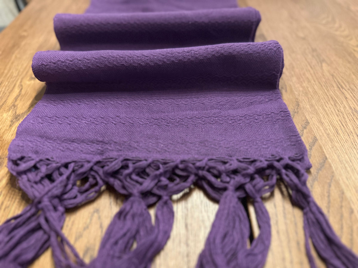 Folded Uva Morada grape purple rebozo showing the subtle woven texture and purple fringe | Lola My Love